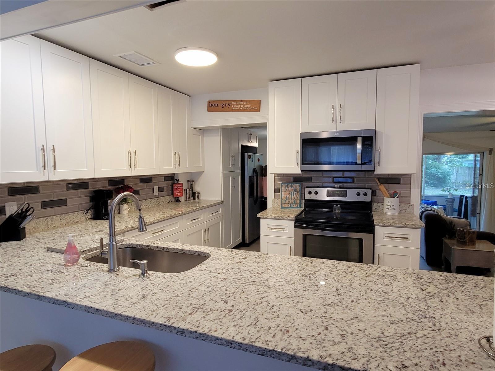 906 E WISCONSIN AVE, DELAND, FL, 32724