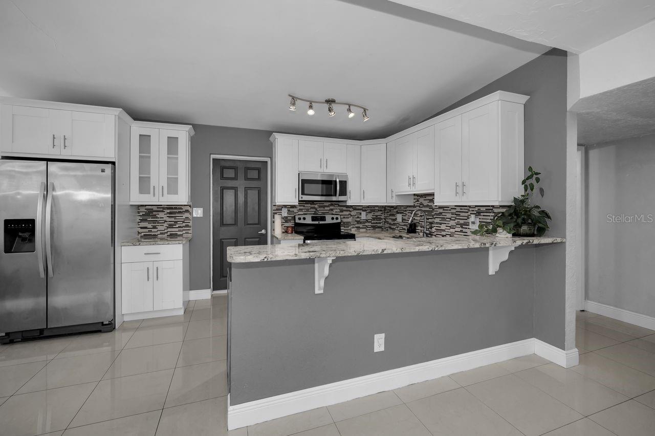 Bar to Kitchen Vacant