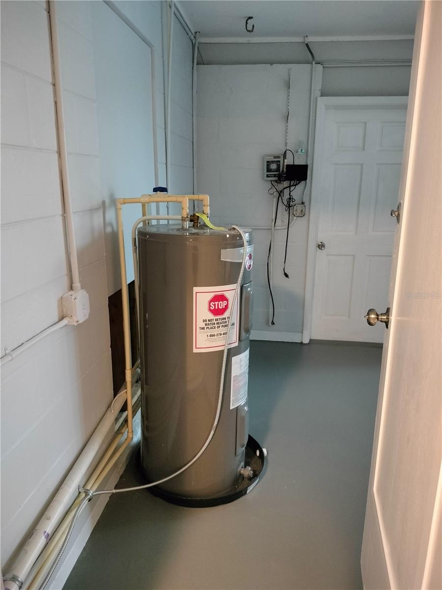 Entrance to garage with side exterior door.