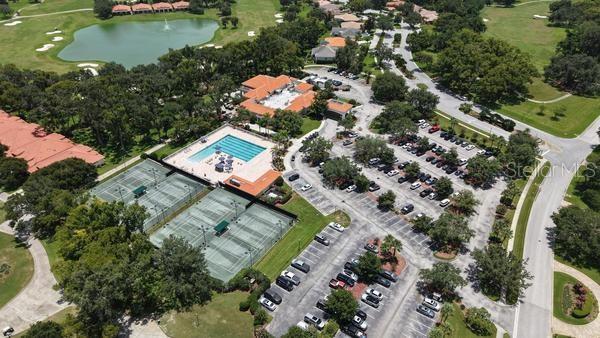 VIEW OF TENNIS COURTS AND POOL