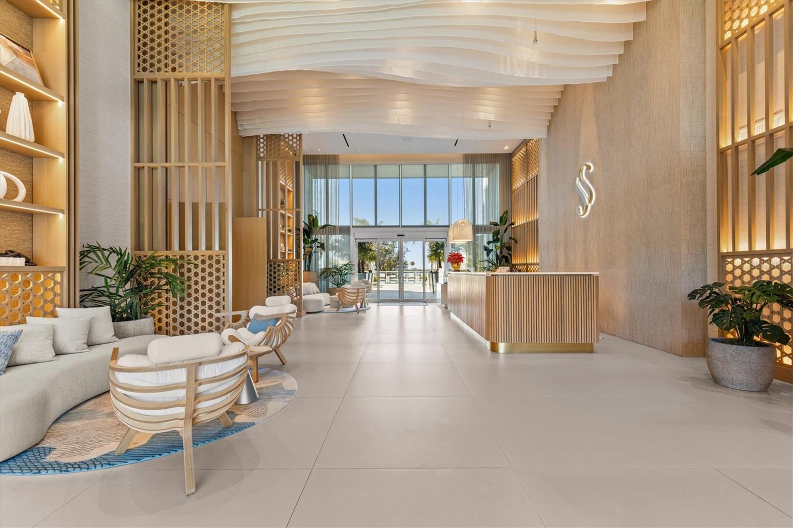 Luxurious Two-Story Lobby with Concierge