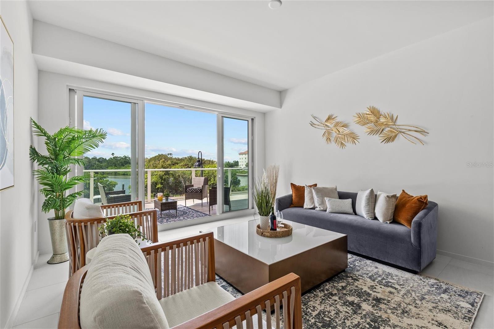 Double-doors to Private Terrace w/ Water views
