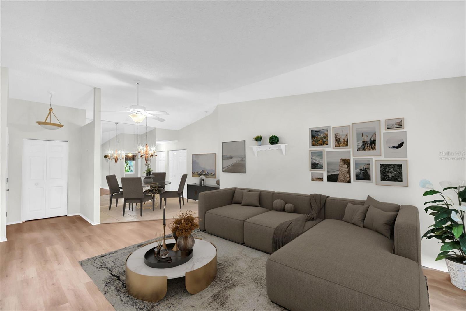 Virtually Staged - Spacious living/dining room combo & convenient front door coat closet~