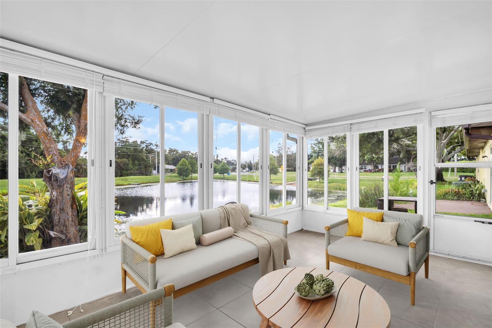 Virtually Staged - Bonus enclosed lanai with peaceful & private water views~