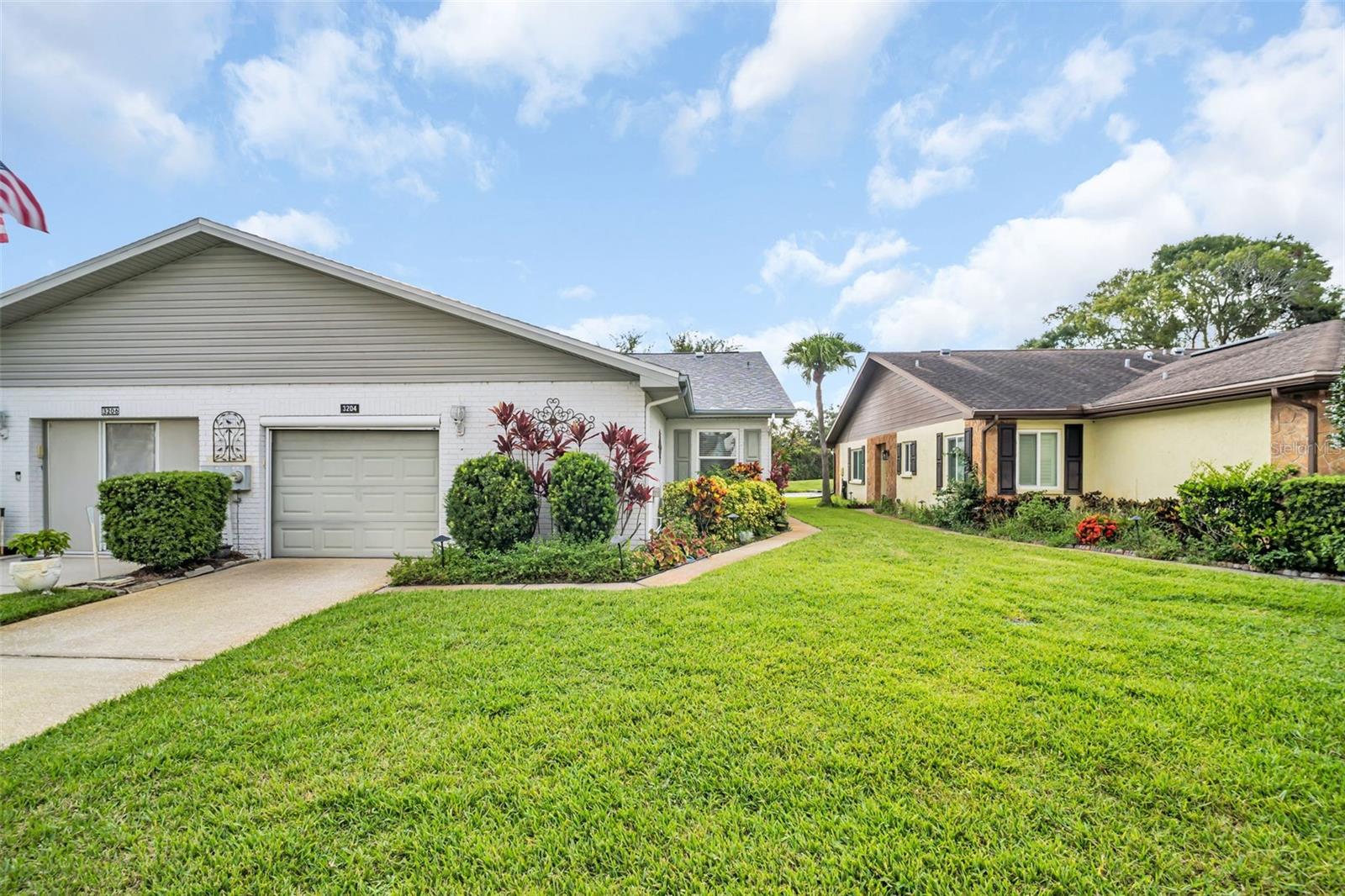 Oversized garage, brand new ROOF (2025), & updated windows~