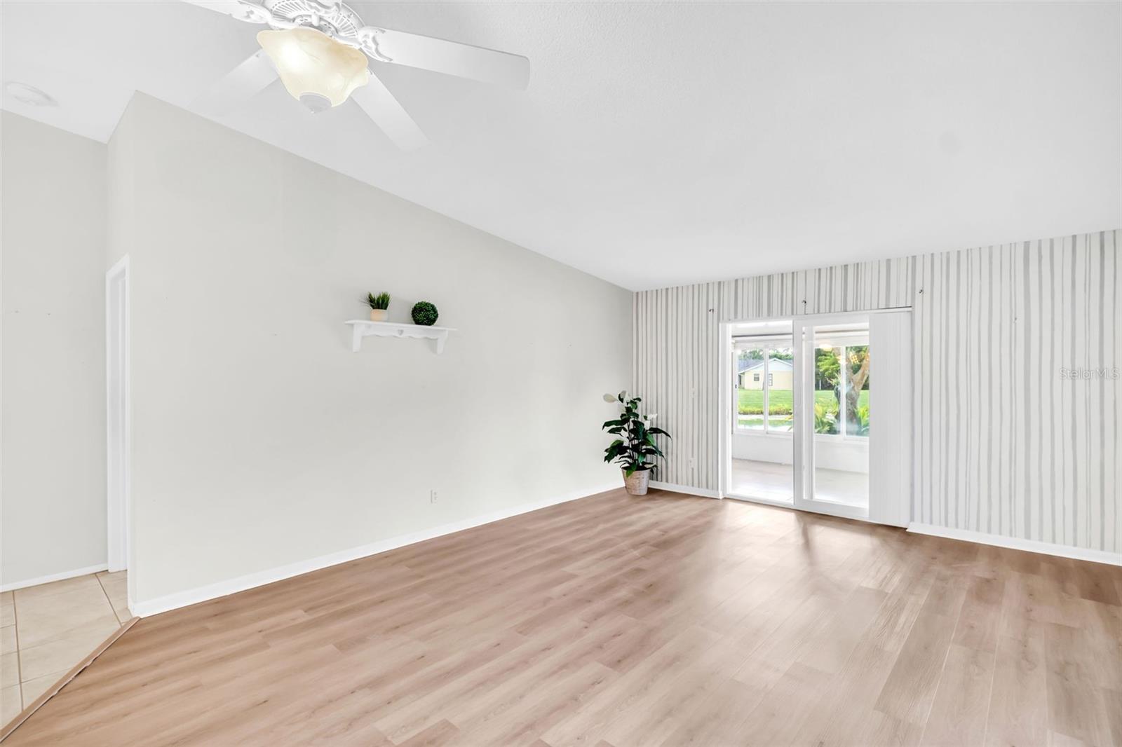 Main living open to bonus enclosed lanai~