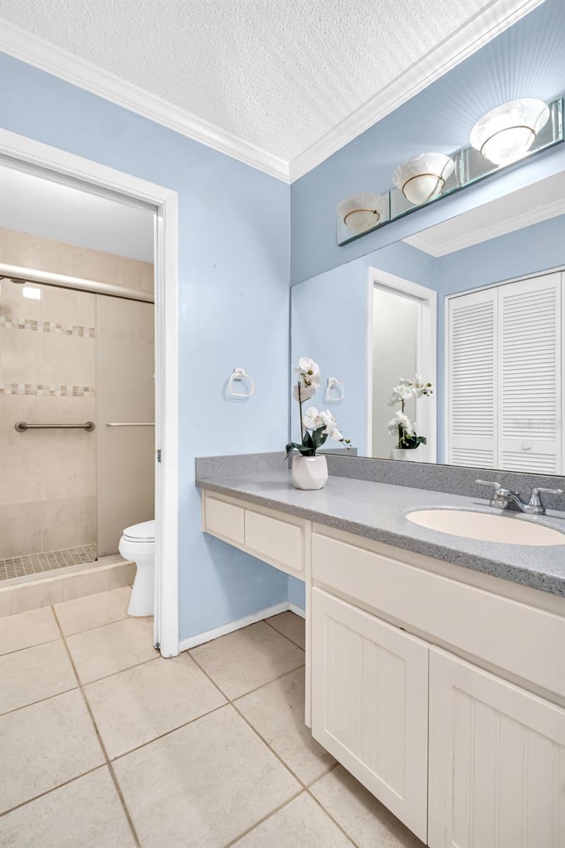 Oversized vanity with updated mirror & lighting~
