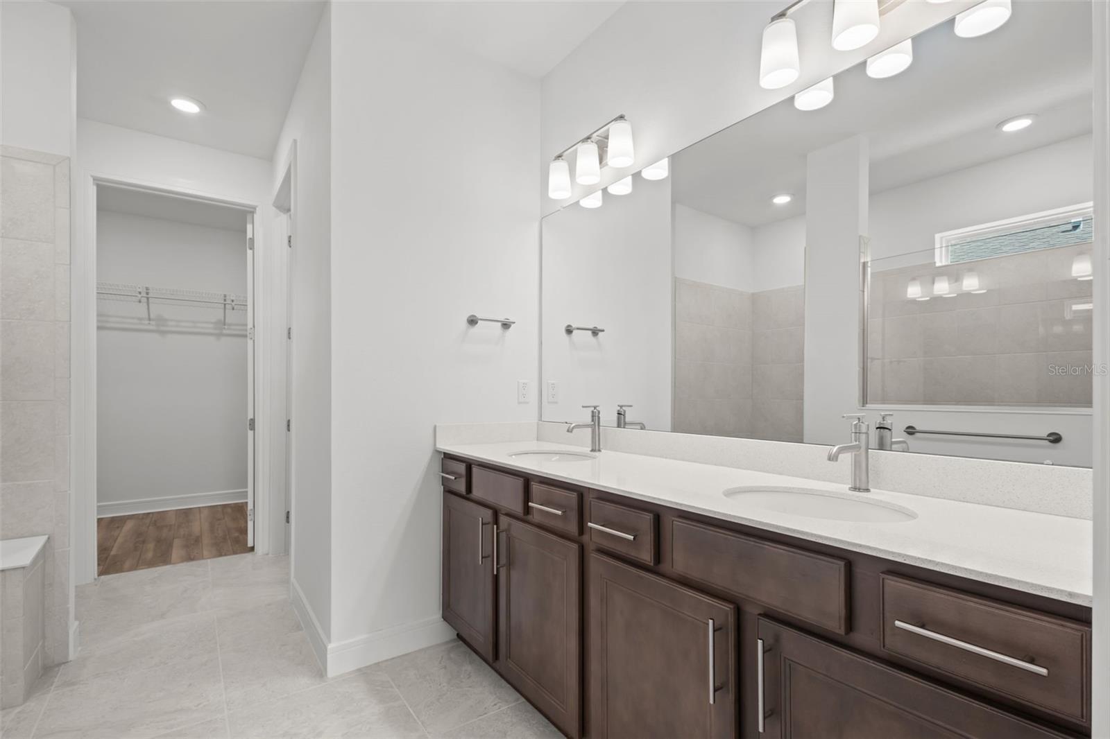 Primary bathroom - en suite - not pictured are the standup shower and walk in closet (end of hall you can see a bit)