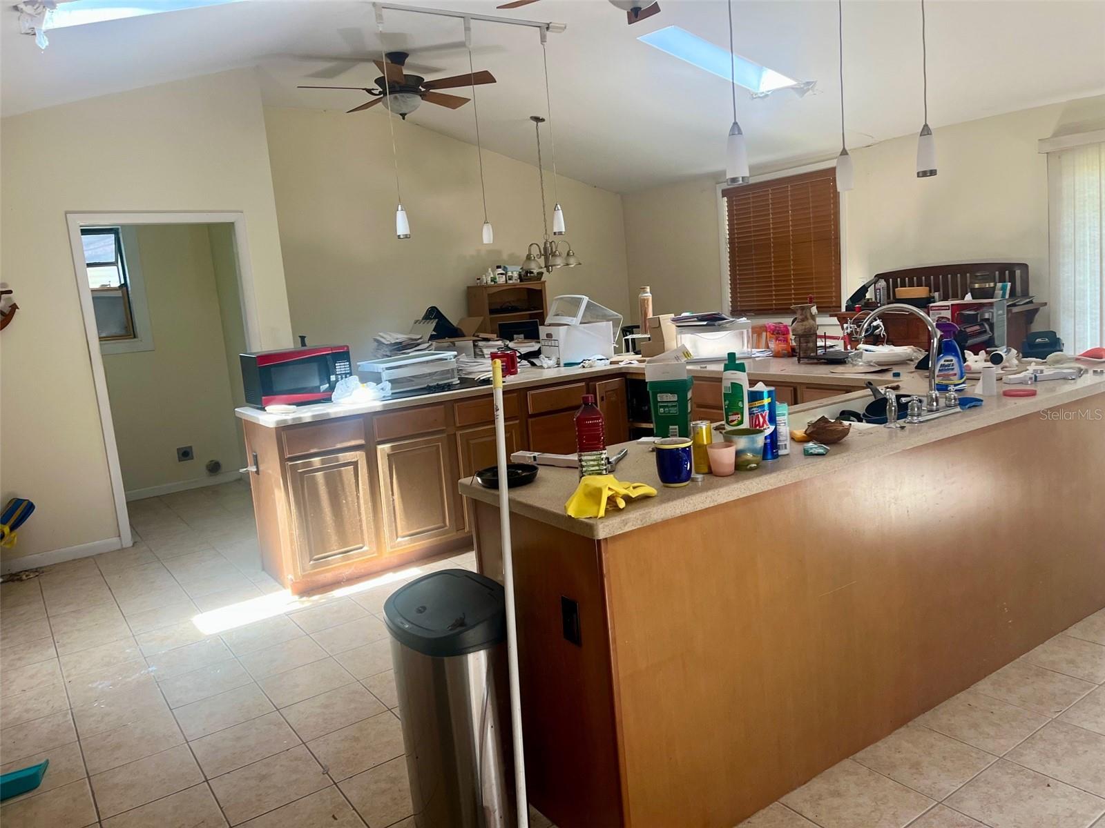 Spacious kitchen with plenty of cabinetry and counters