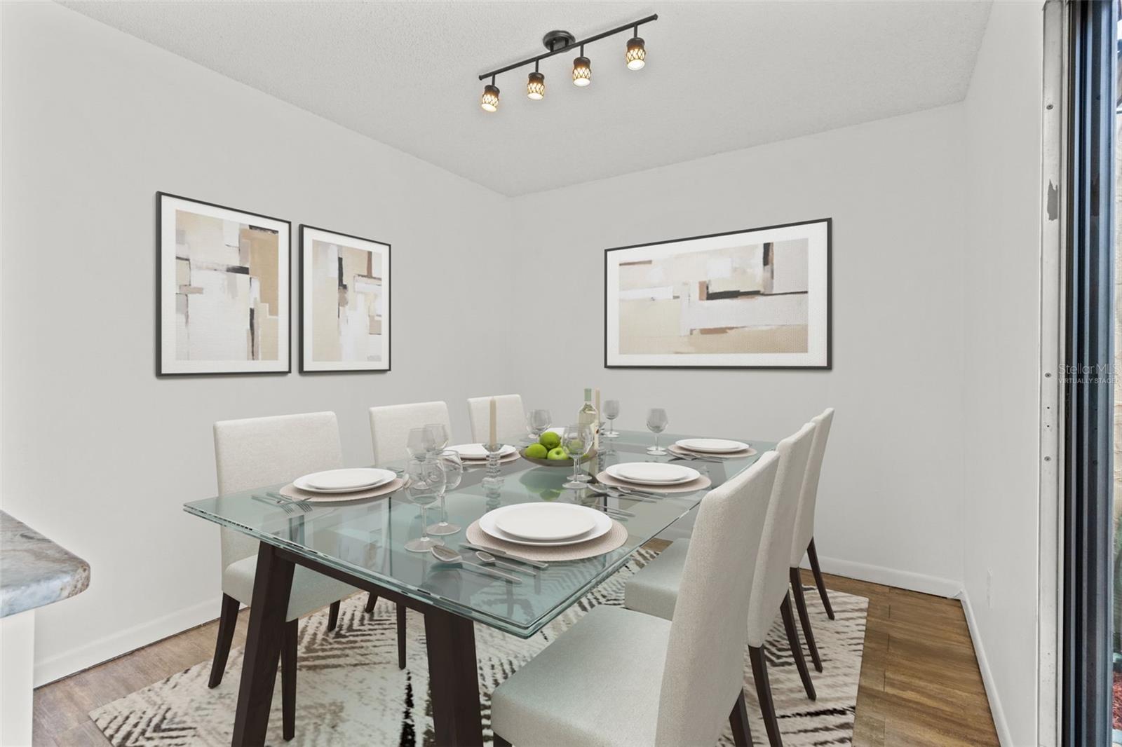 Virtually Staged dinning room view from kitchen