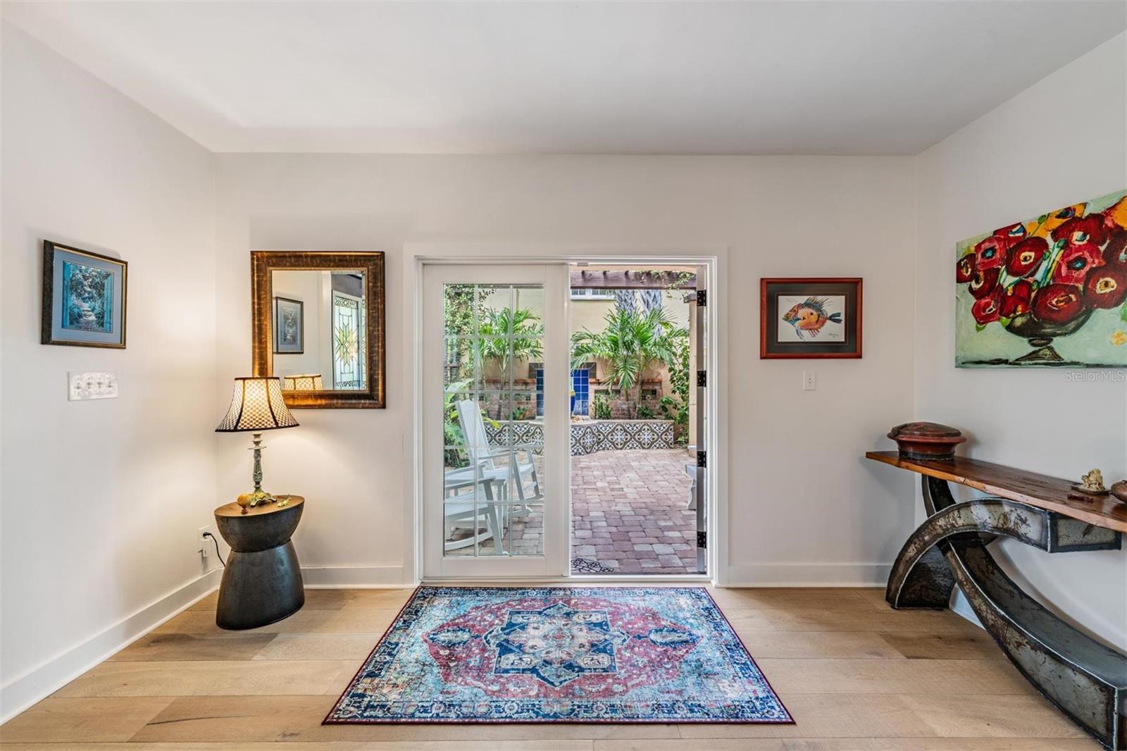 French doors open to Court Yard