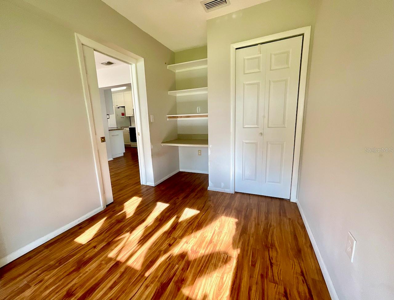Bedroom built in desk with closet