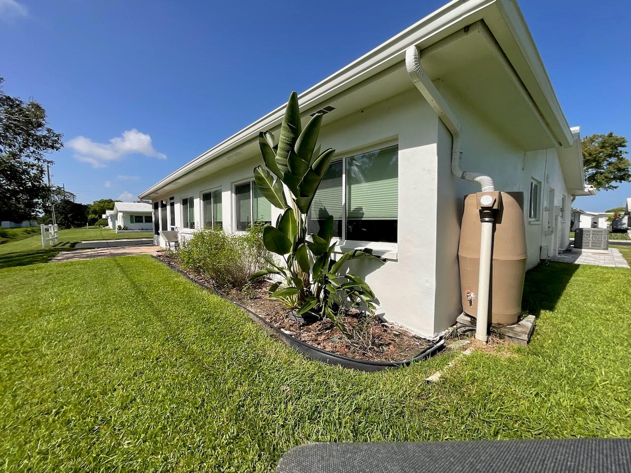 Exterior back and garage side of house