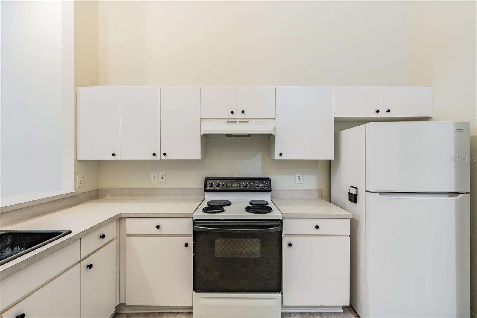 The kitchen is open to the Family Room.