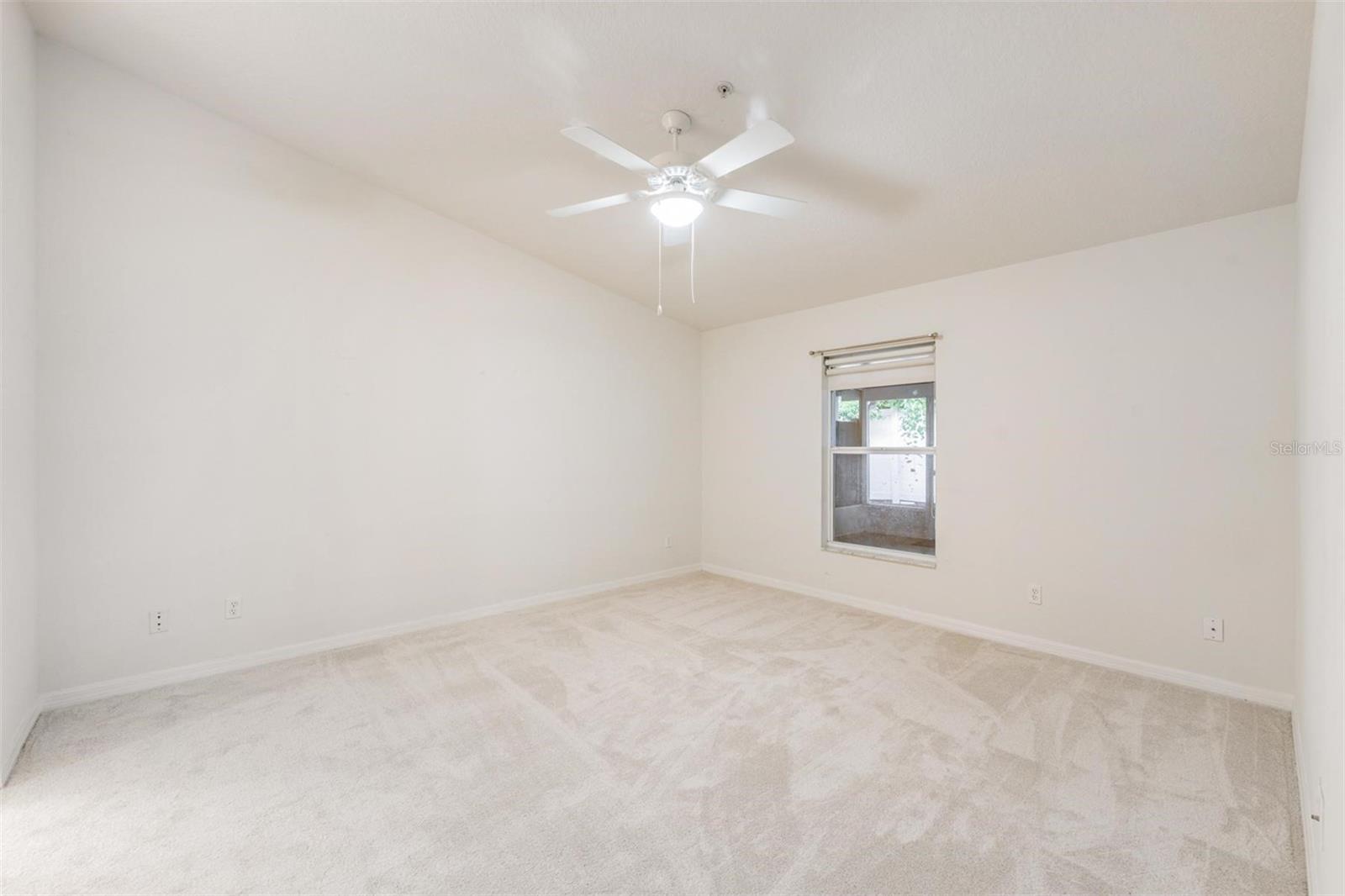 Master Bedroom, New Carpet and Ceiling Fan with light fixture.