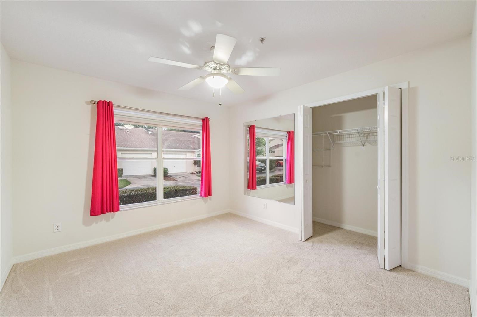 Front Guest Room, New Carpet and Ceiling Fan with light.