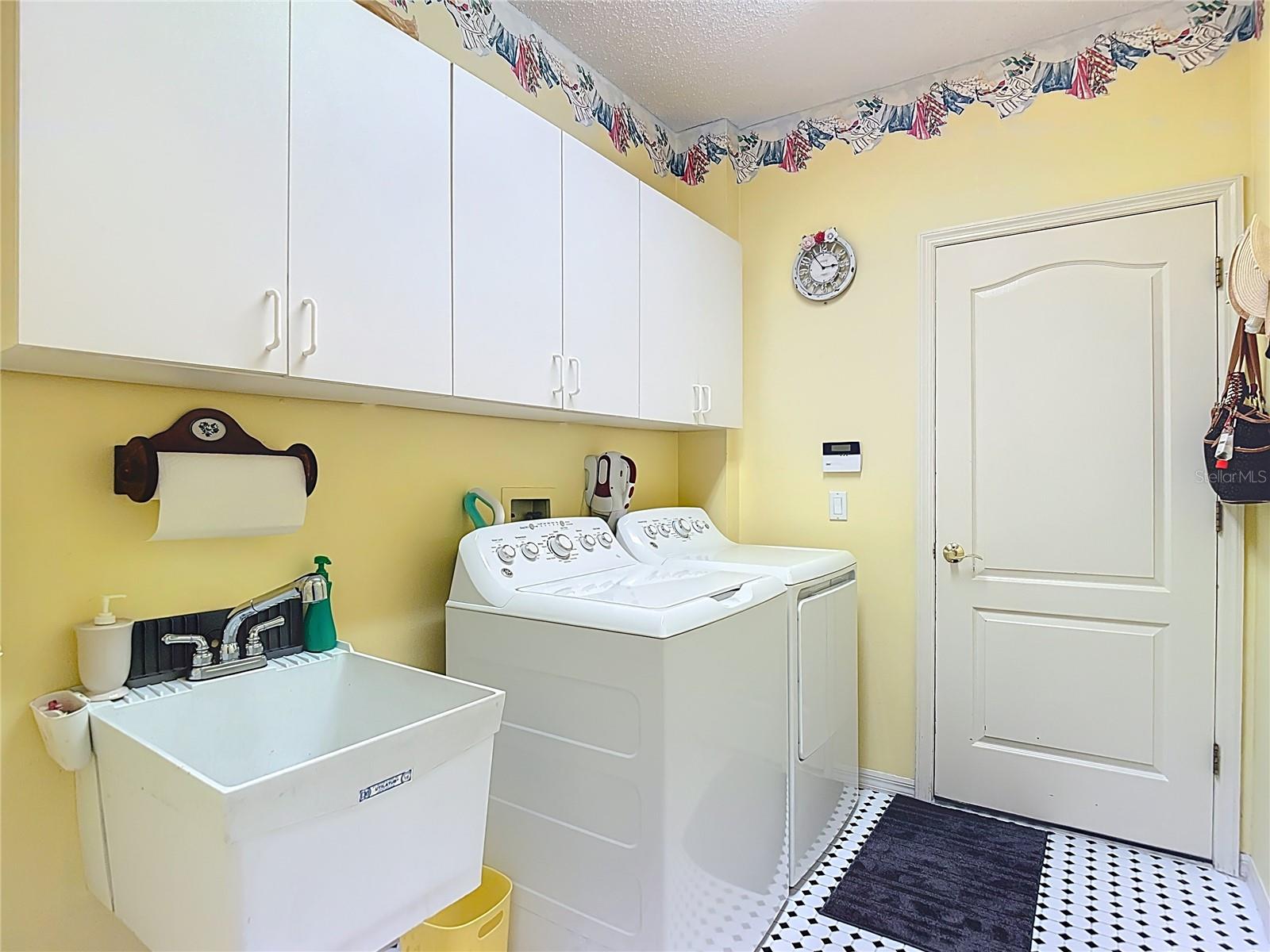 Laundry room on way to garage