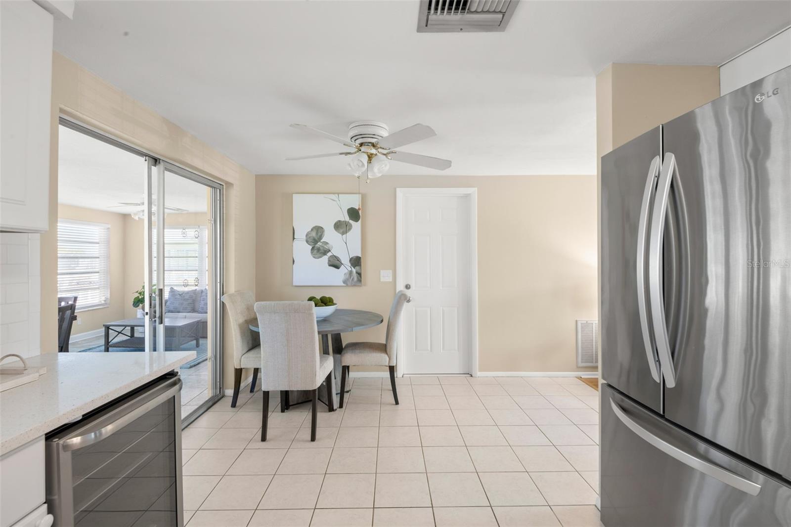 Stainless appliances, spacious quartz counters for prep while cooking