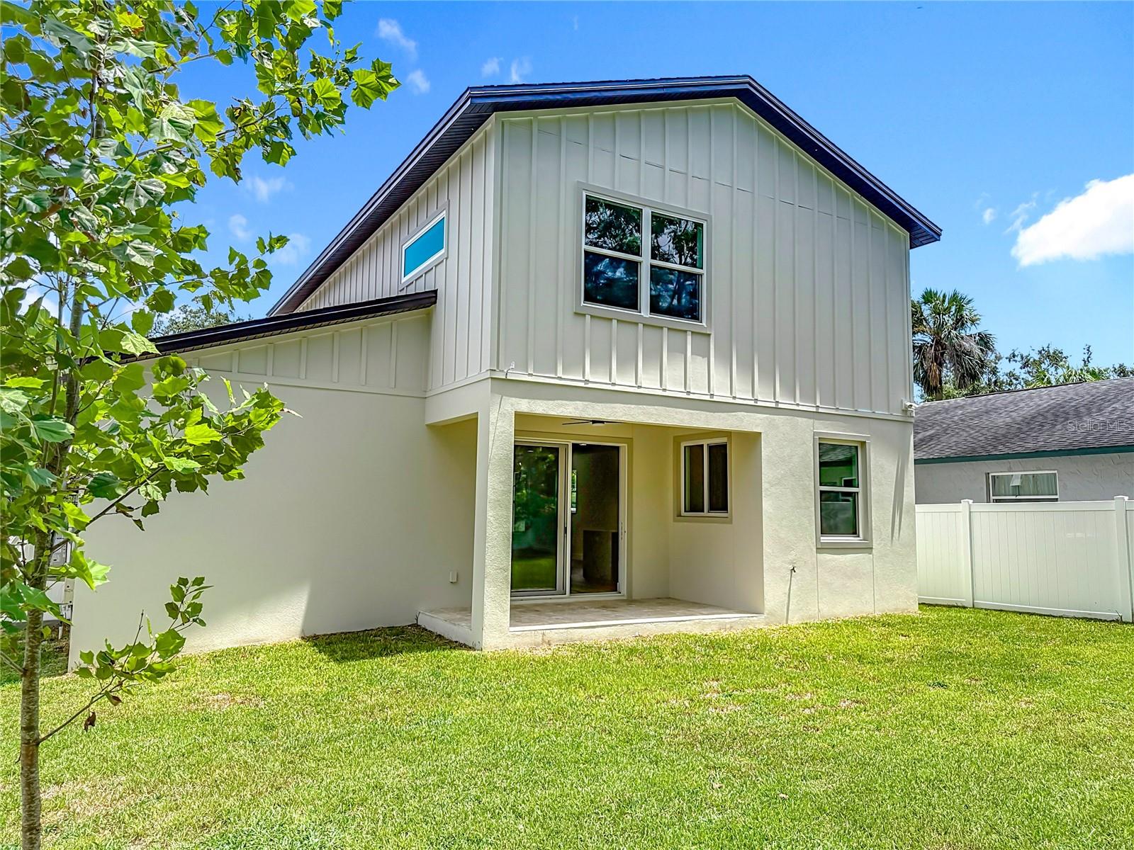 Fully fenced backyard with room for a pool.
