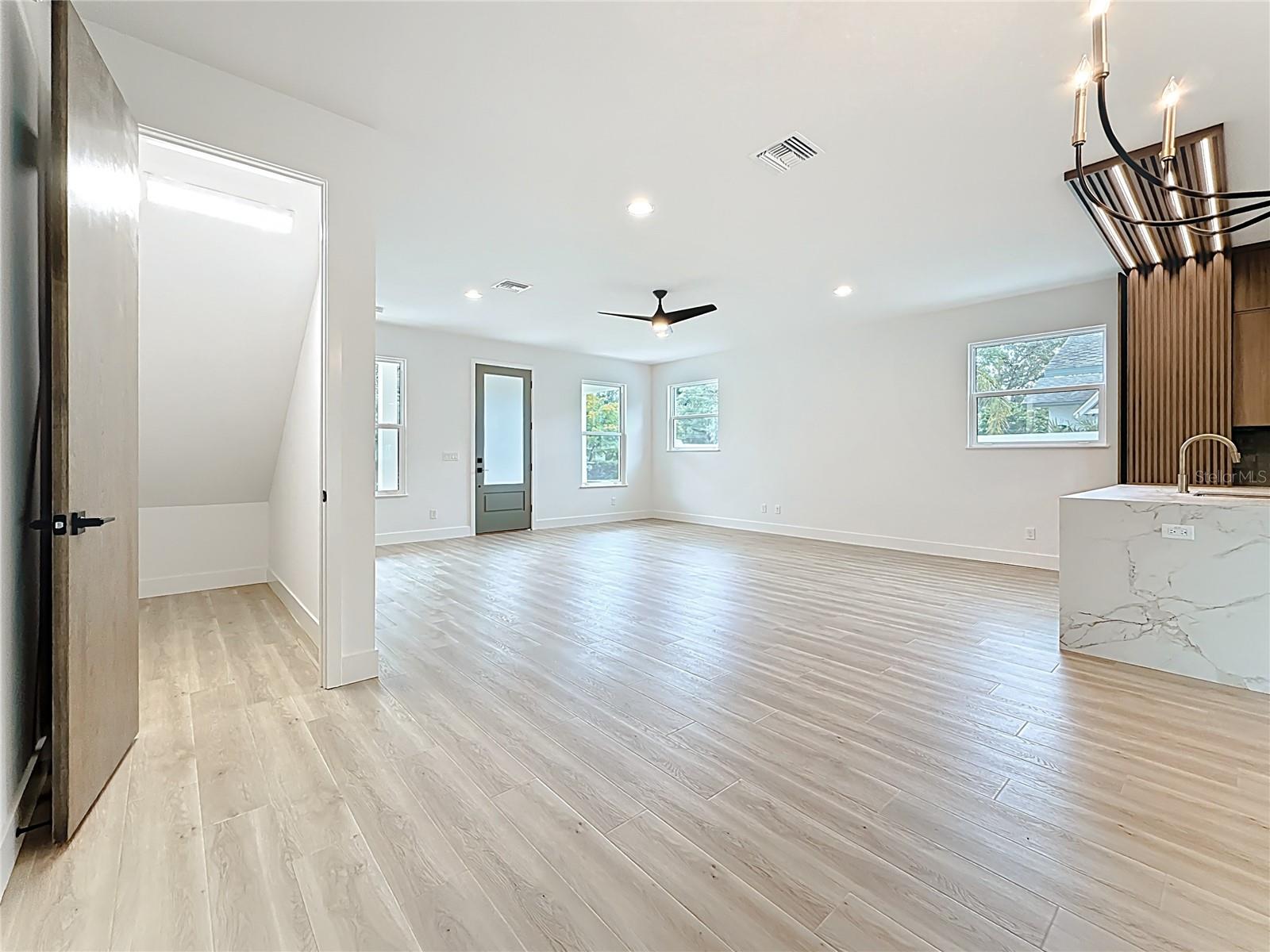 Dining area plus additional storage tucked under the stairs.
