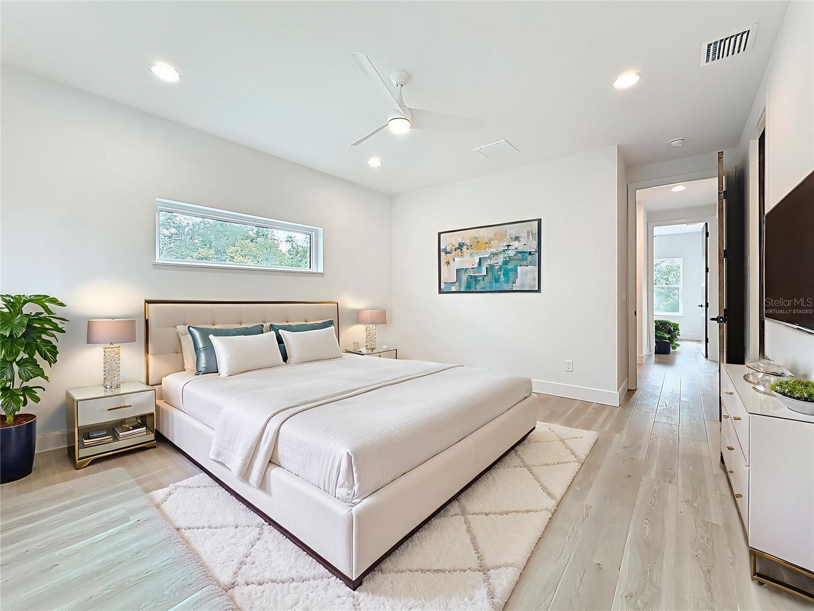 VIRTUALLY STAGED PHOTO. Primary Suite.