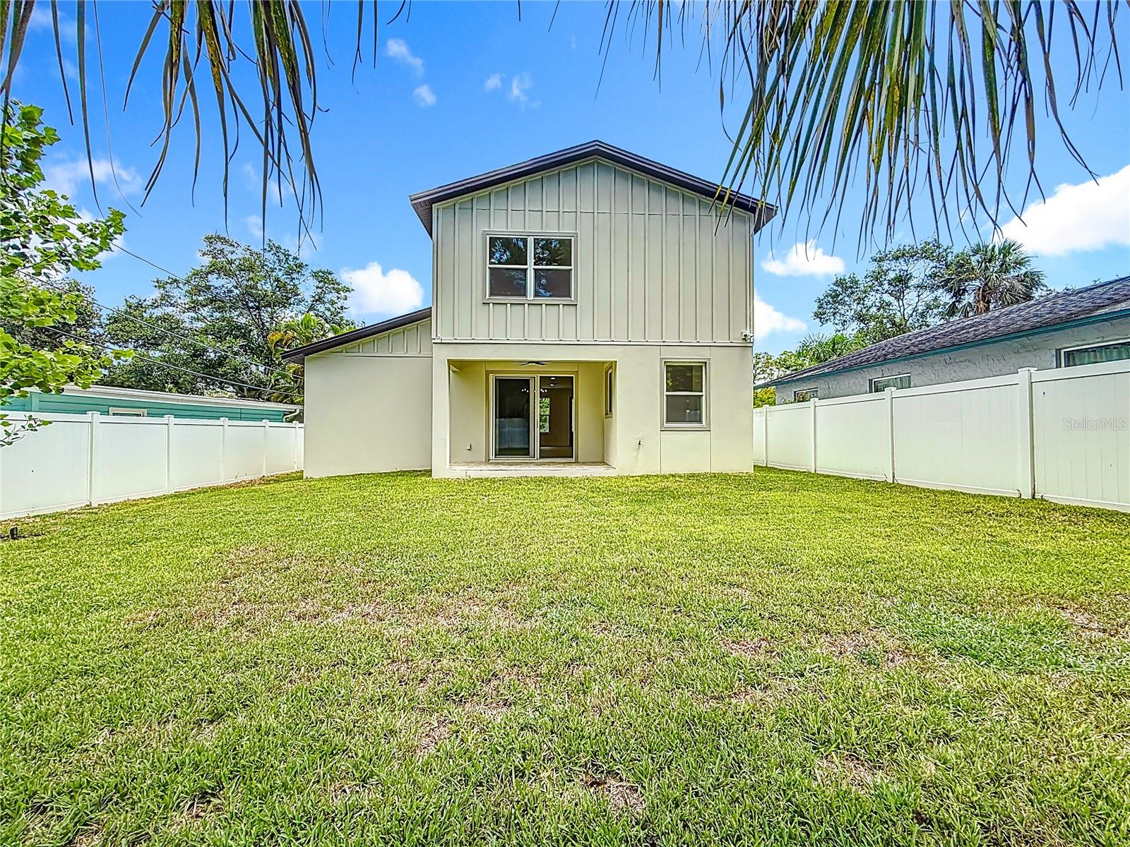 Fully fenced backyard with room for a pool.