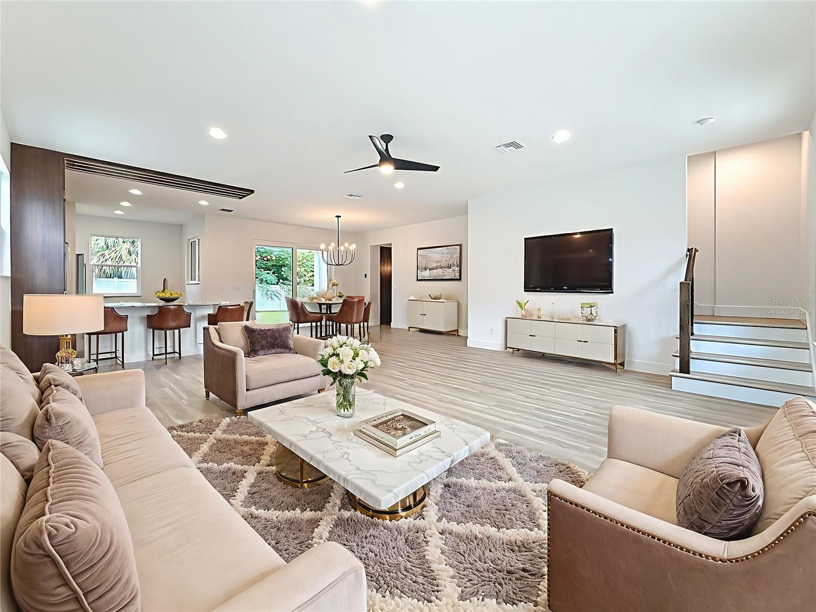 VIRTUALLY STAGED PHOTO. Great Room. View from the front door.