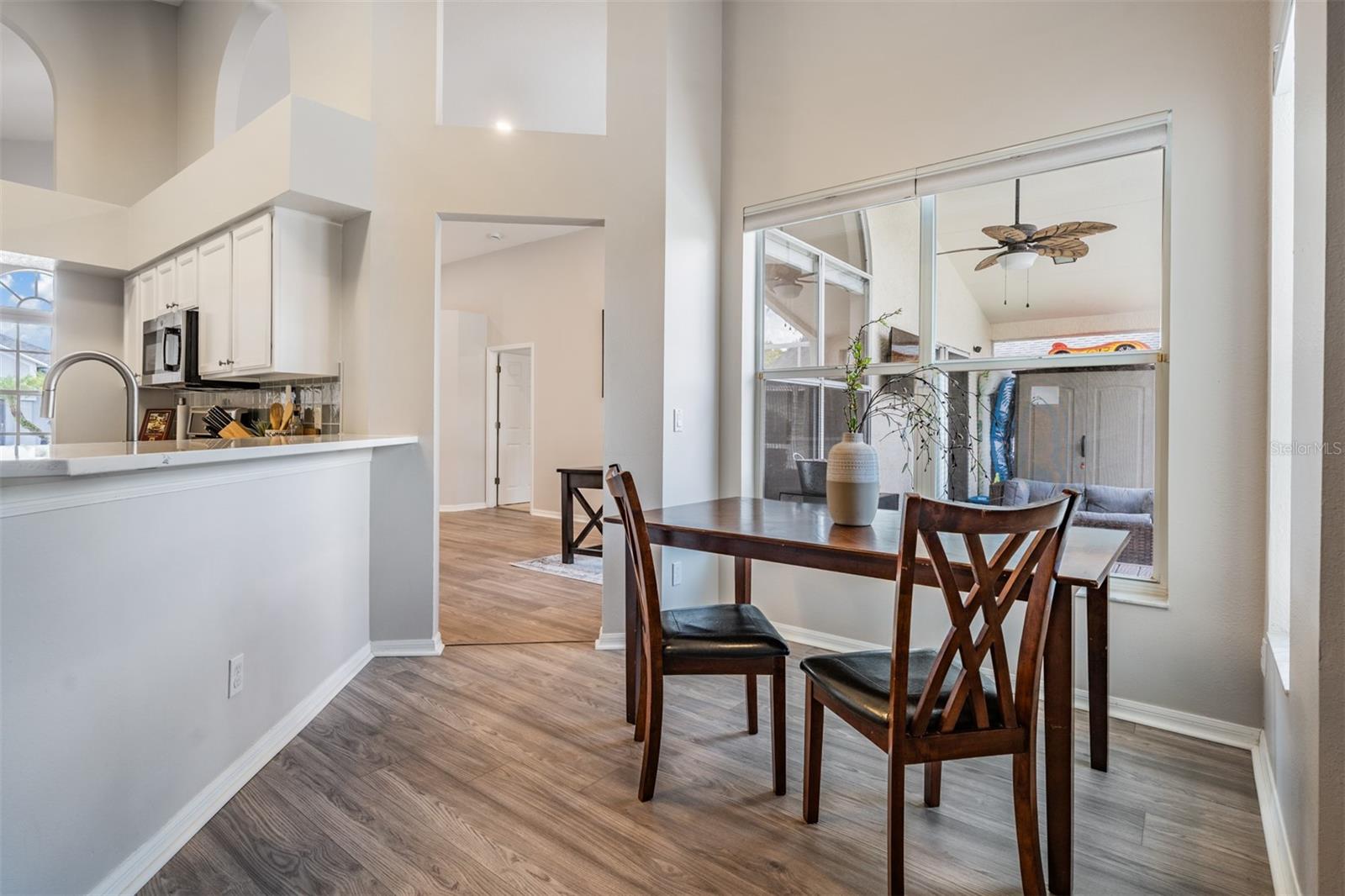 Dinette area, lots of sunlight, New LVP Flooring.