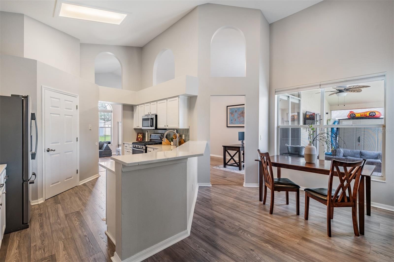 Kitchen open to the dinette area and the great room.