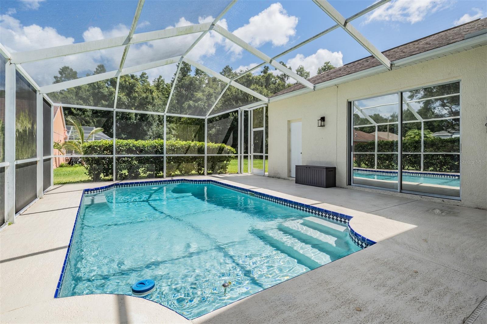 Screened Lanai and Pool area.