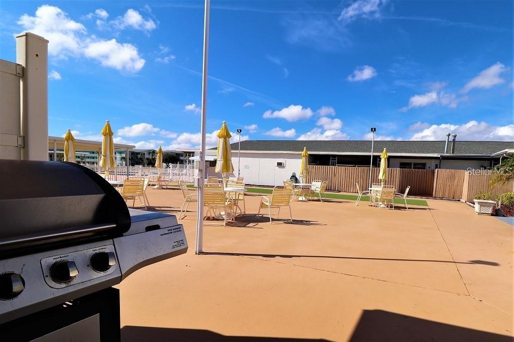 Grilling area by swimming pool.