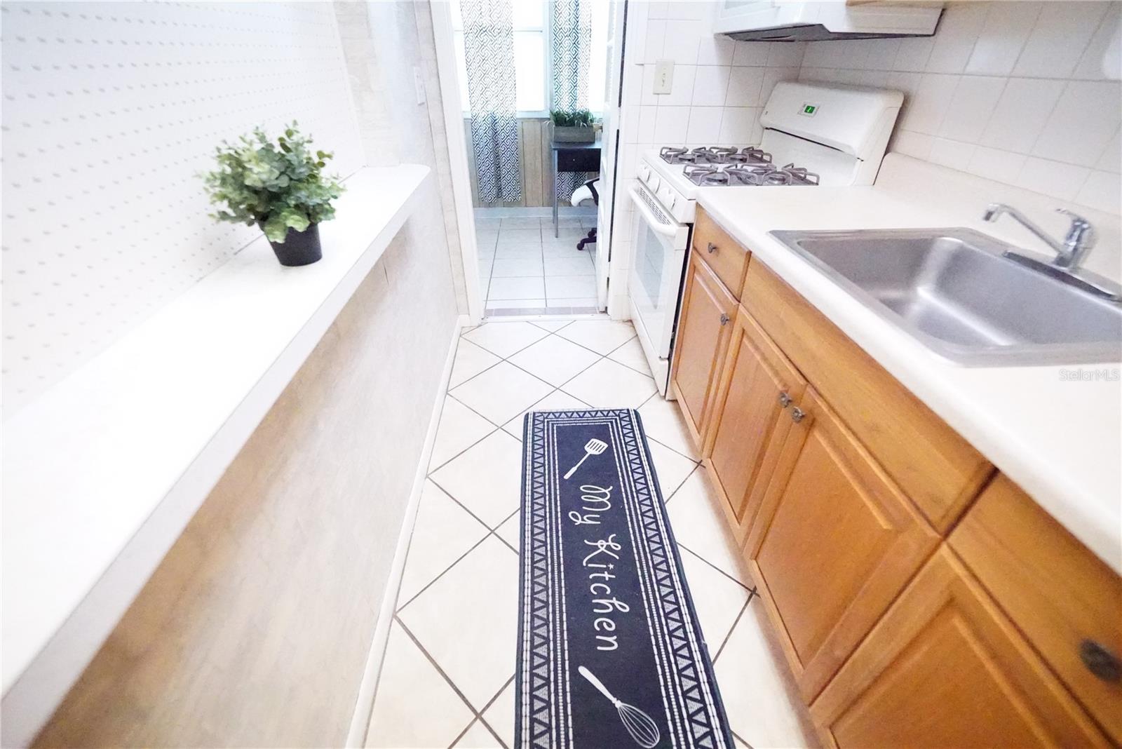 Kitchen with kitchen flooring visible