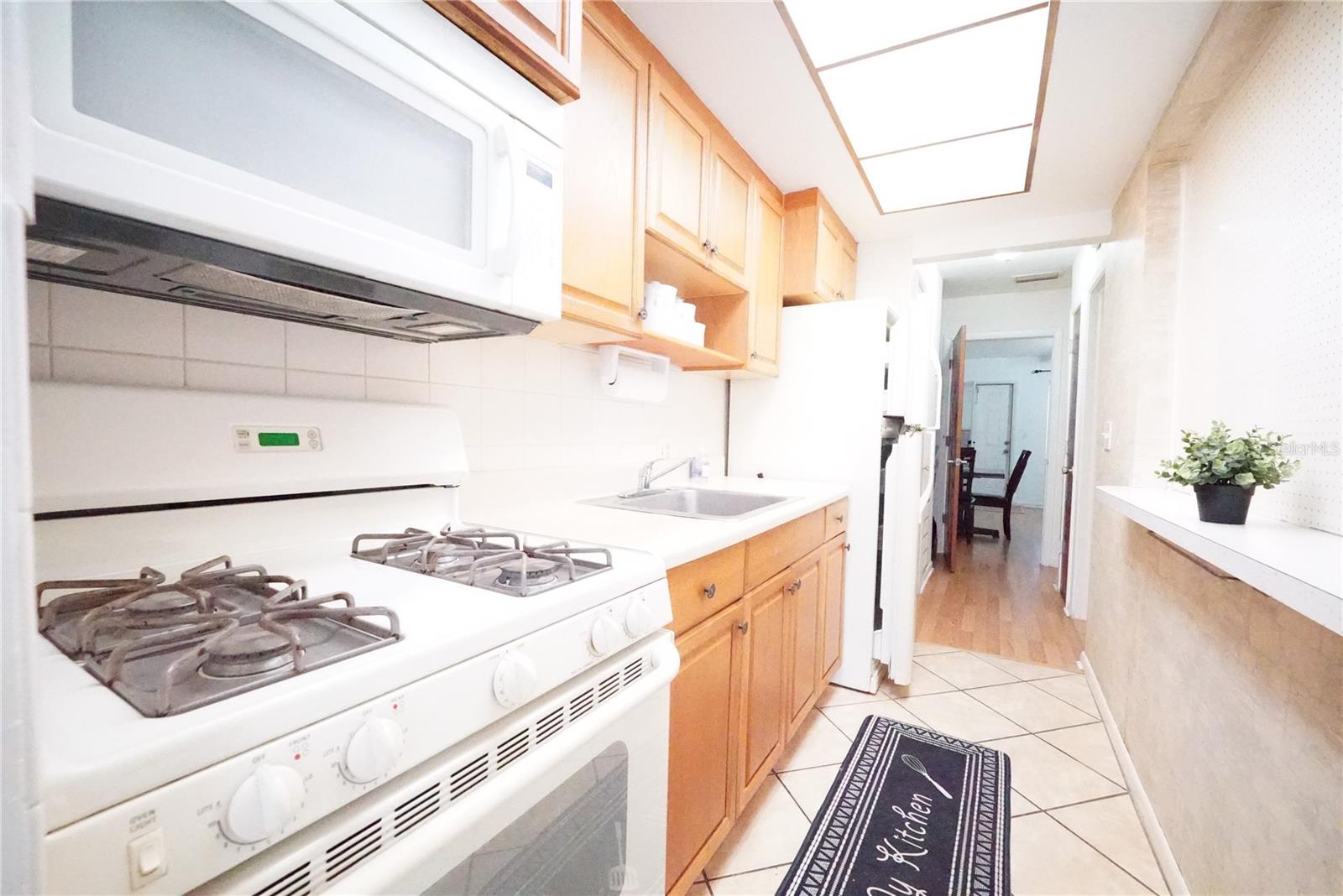 Kitchen with view toward living-dining room.