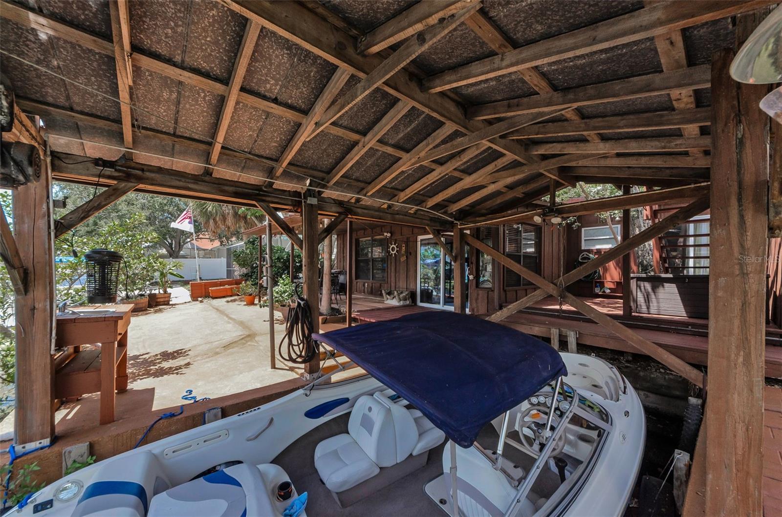Boat house adjacent to rear patio