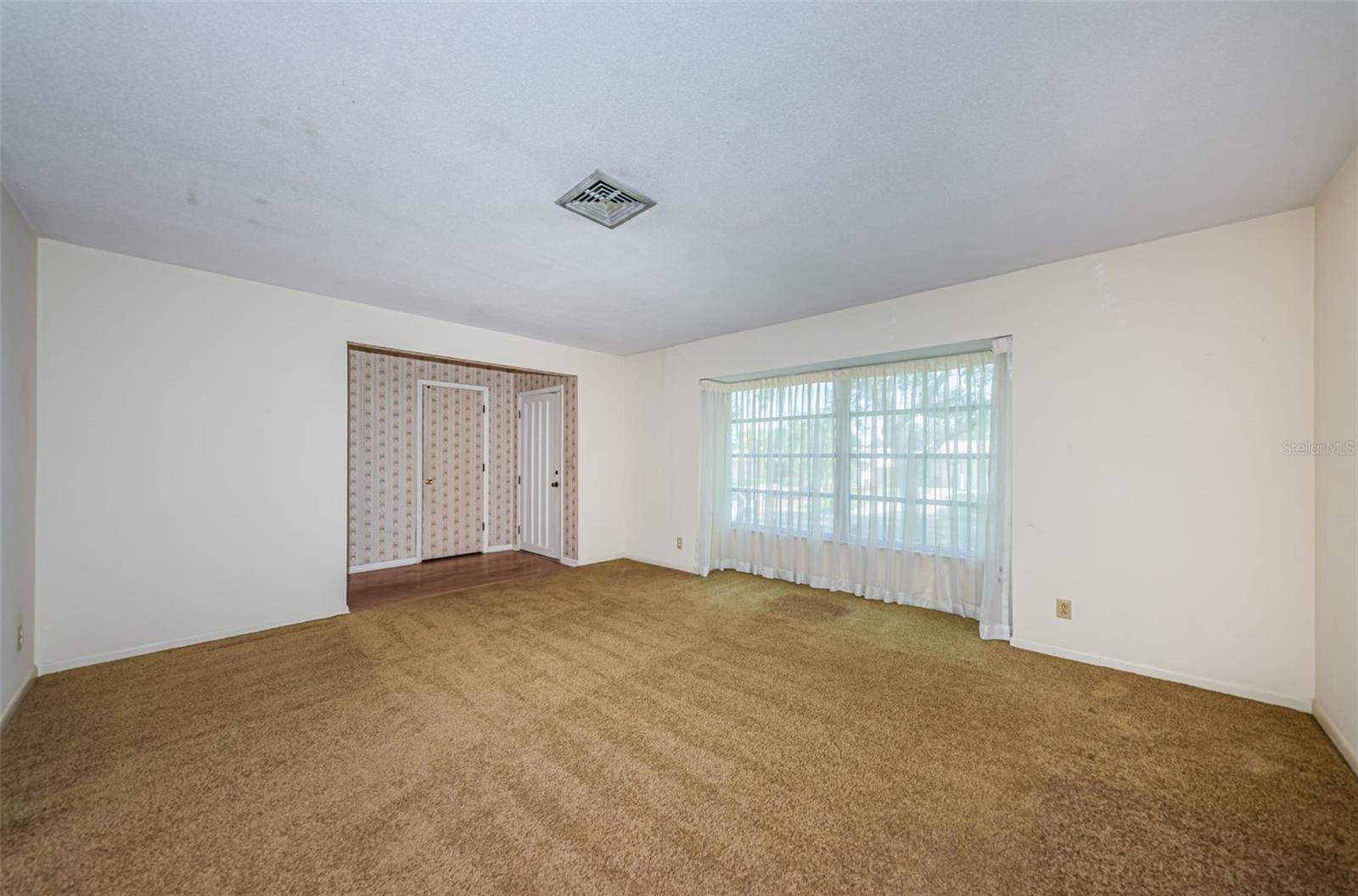 Living room with view to front door