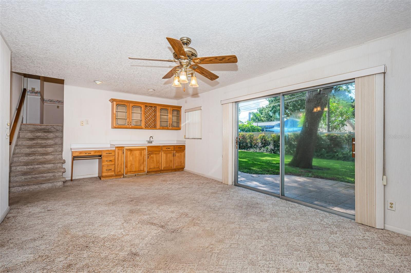 Family/bonus room with sliders to the back yard