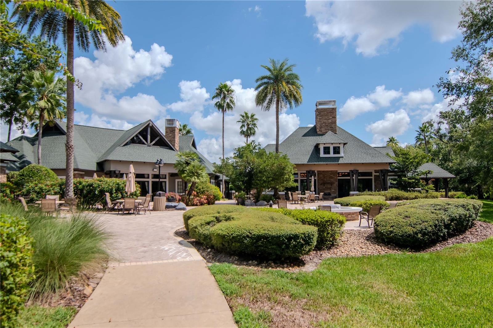 View of WLP Lodge in Back with Firepit, Access to Resort Style Pools, Waterfront & More