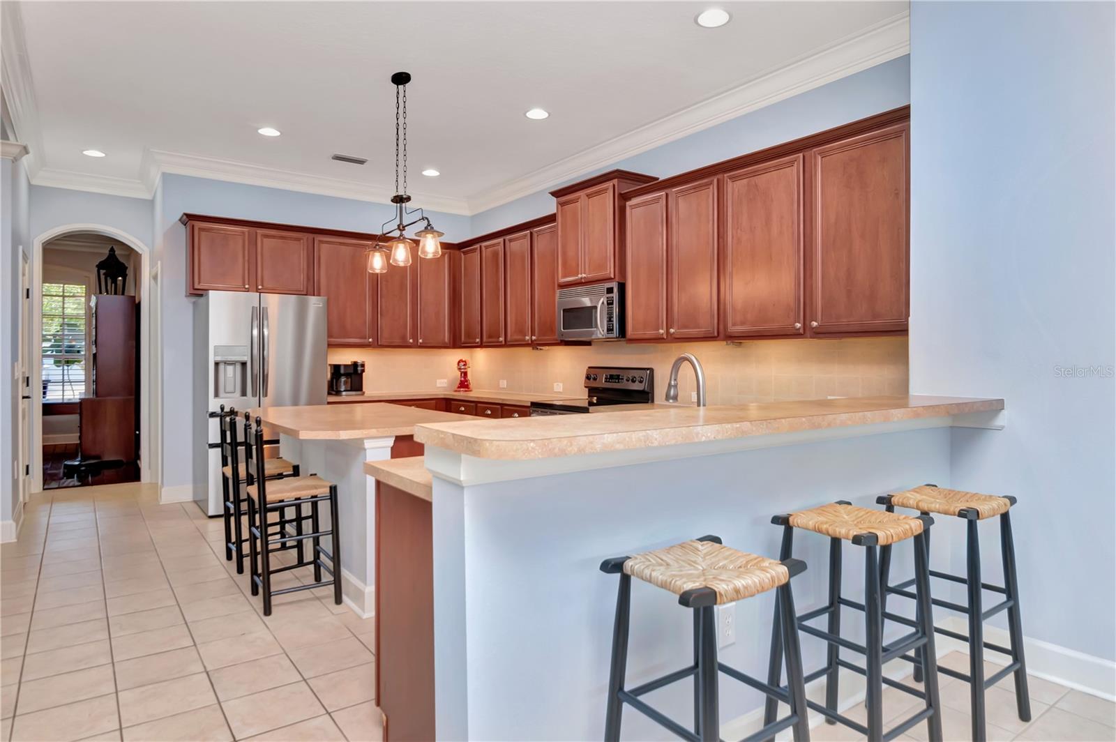 Kitchen with Island, Breakfast Bar, Stainless Steel Appliances, Counter/Storage Space