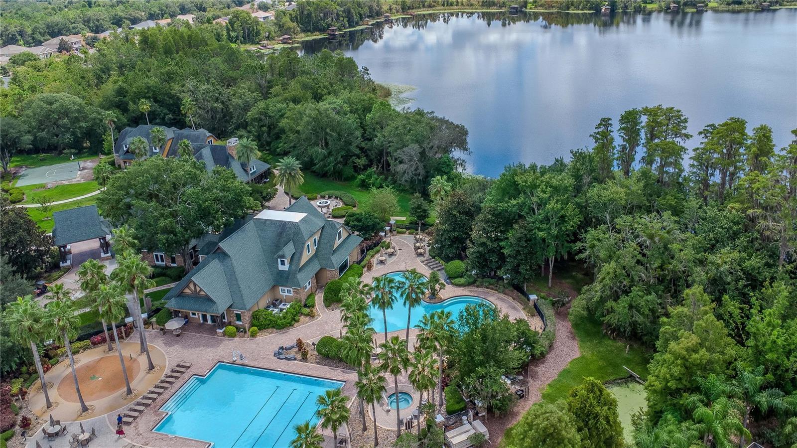 Aerial View of Wilderness Lake Preserve Lodge, Resort Style Pools, and Waterfront