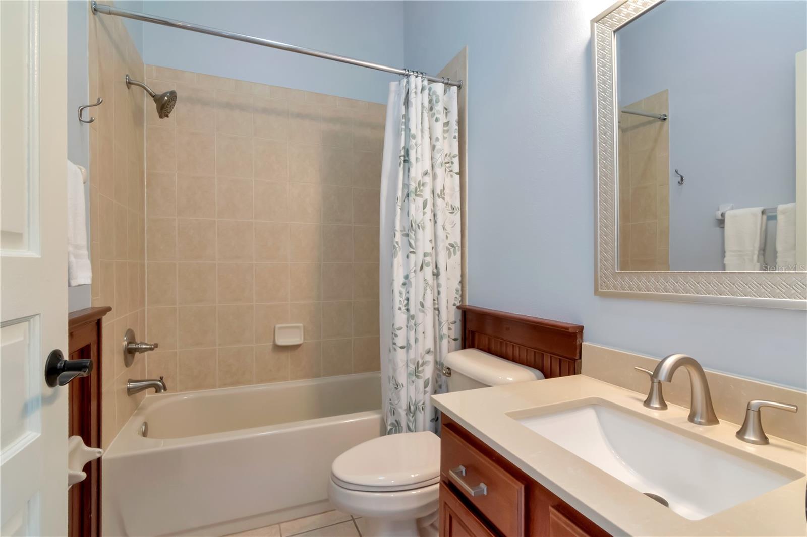Full Poolside Bathroom with Tub & Shower