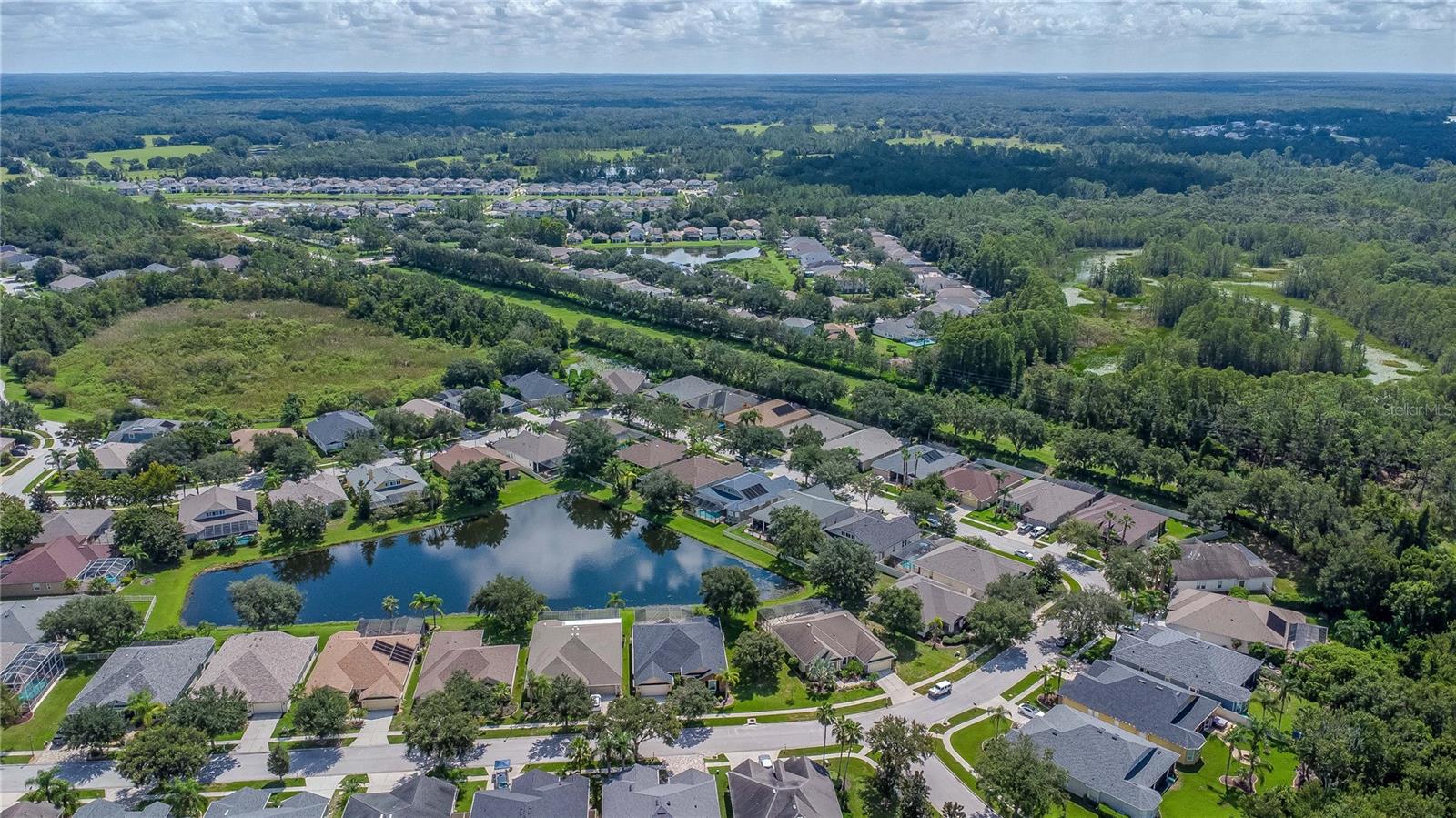 Aerial View of Home and Surrounding Area