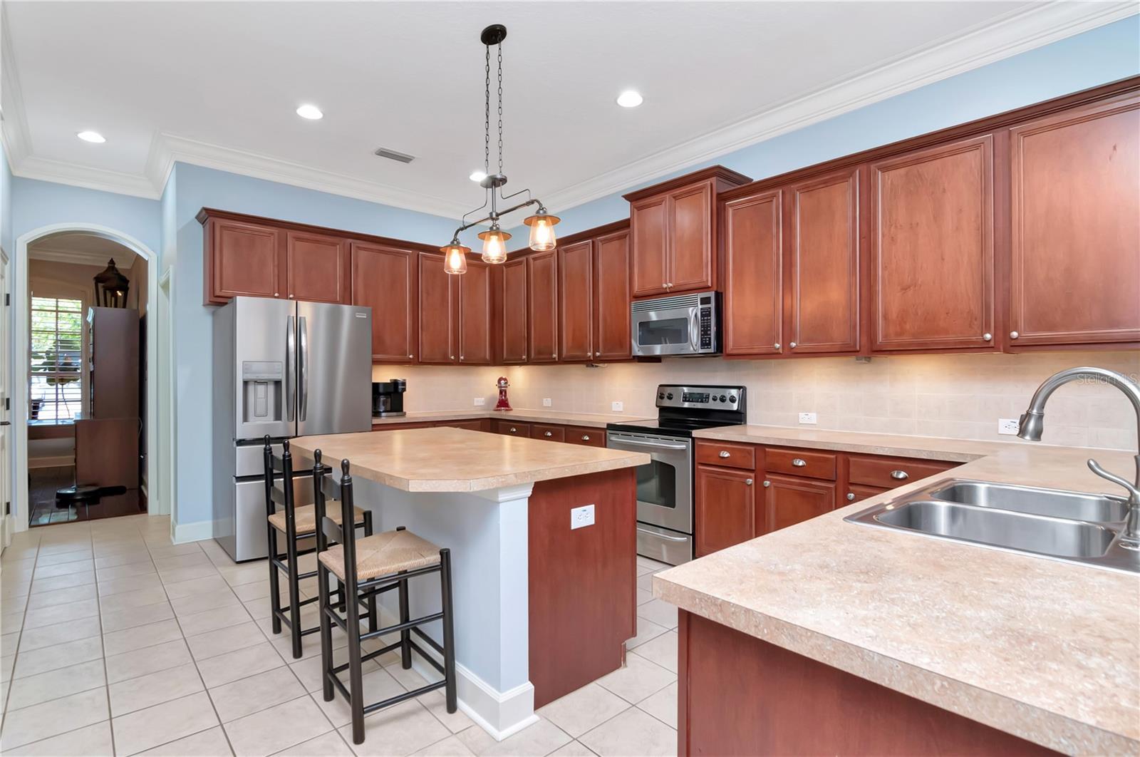 Kitchen with Island, Breakfast Bar, Stainless Steel Appliances, Counter/Storage Space