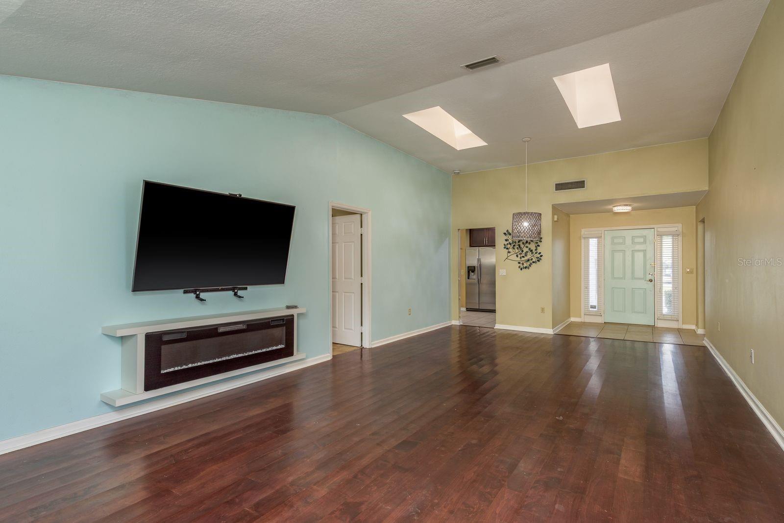 Living room television and living room decorative fireplace convey