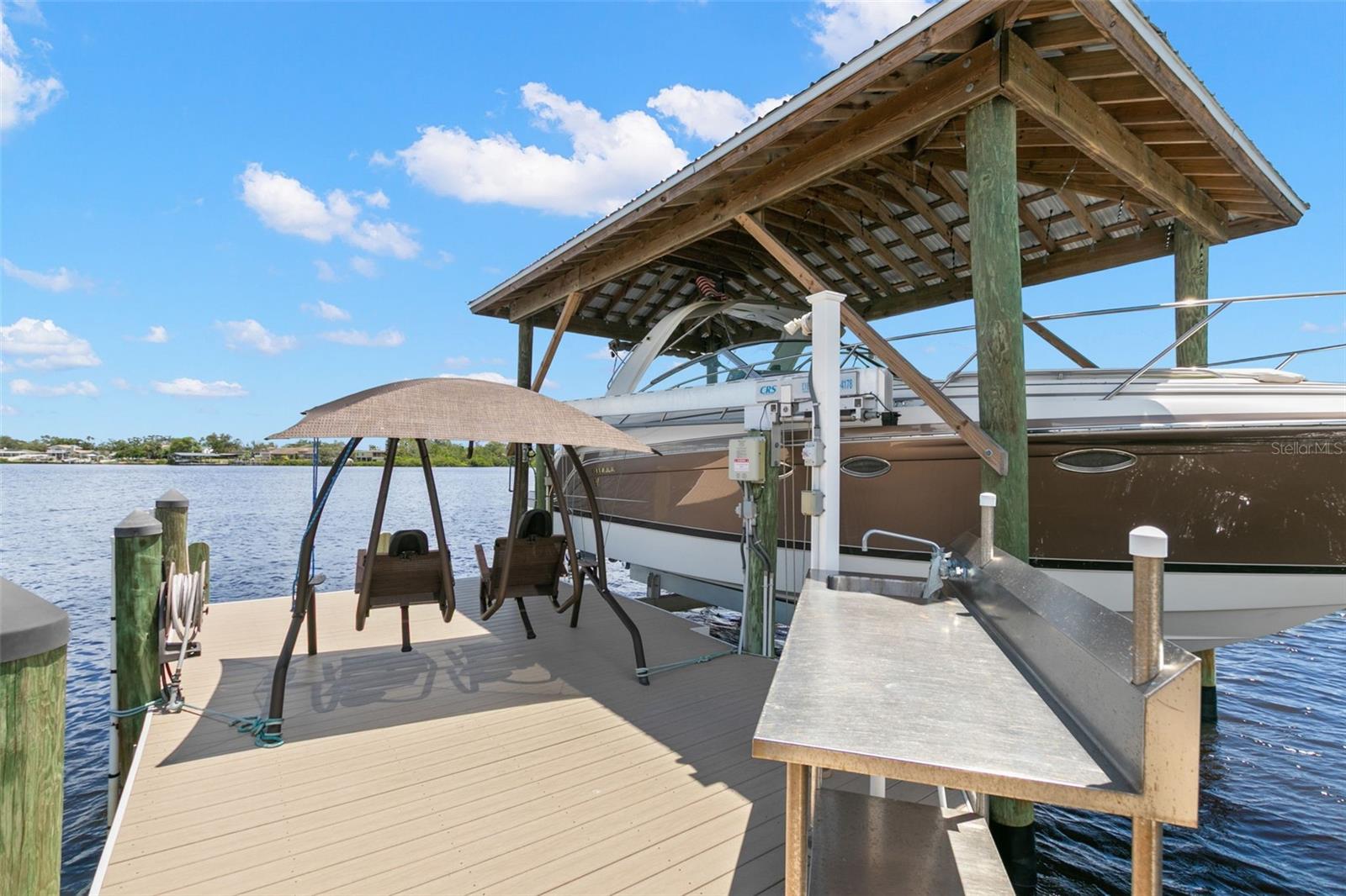 Dock with electric, water and fish cleaning station