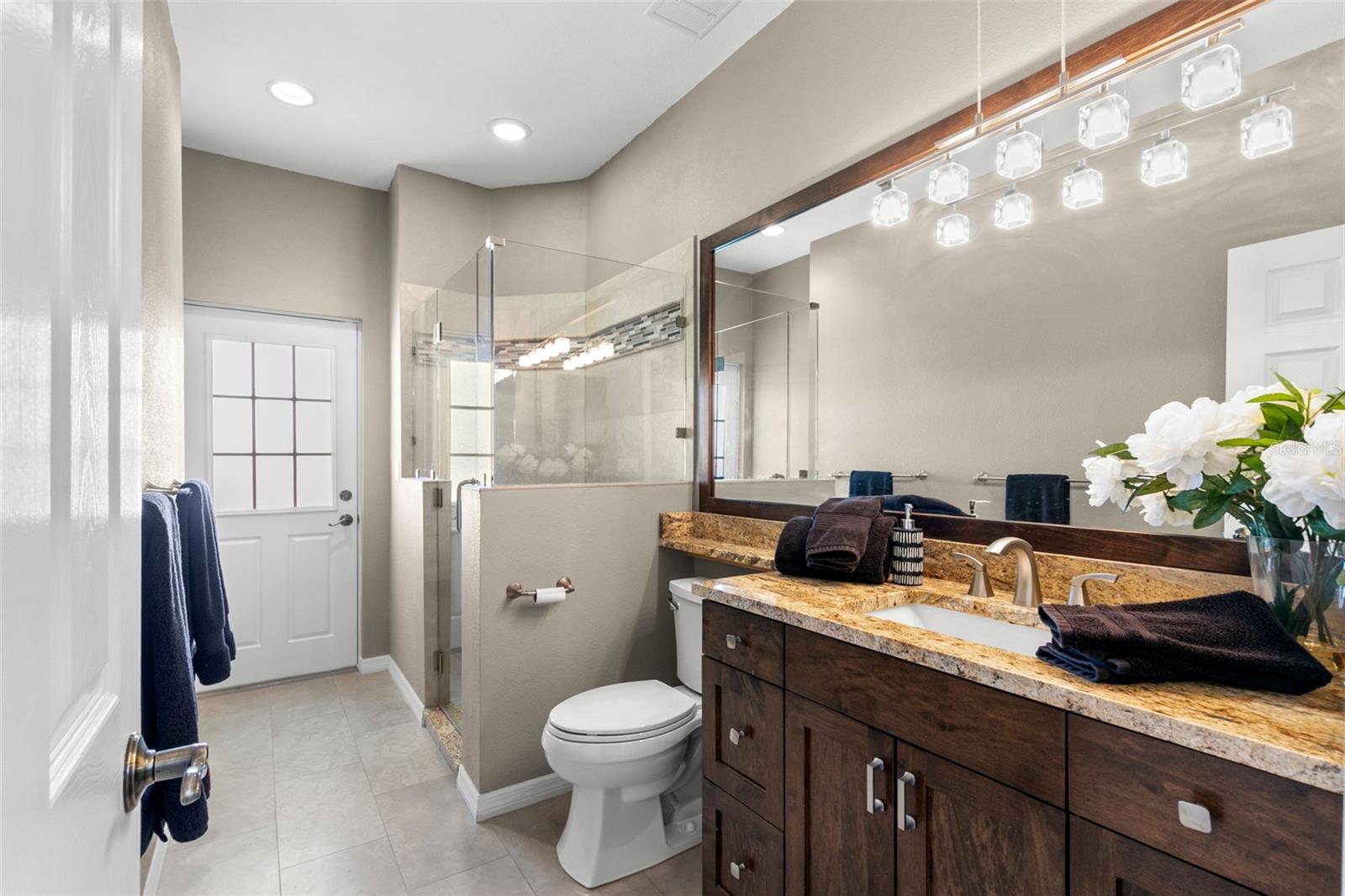 First floor full bath with pool access