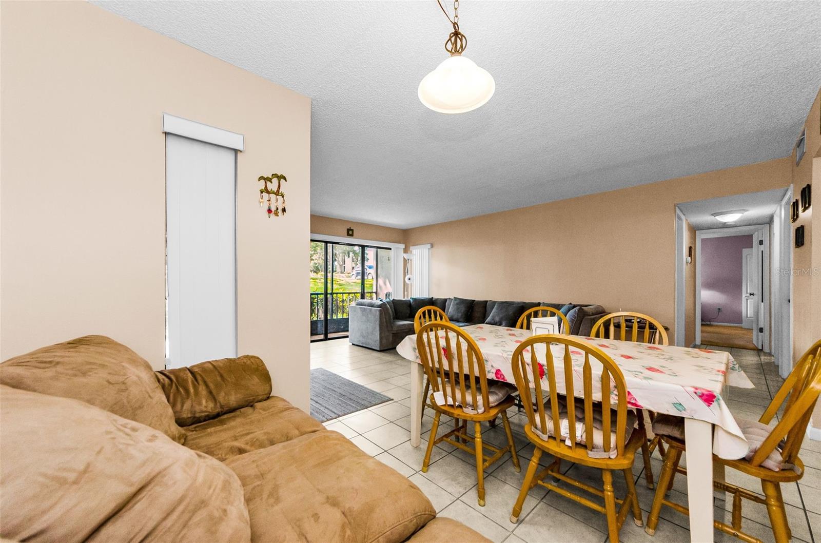 Dining Room opens to Living Room and next to Kitchen.