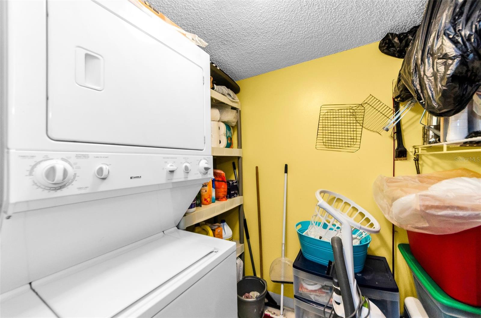 Separate Laundry Room with Storage