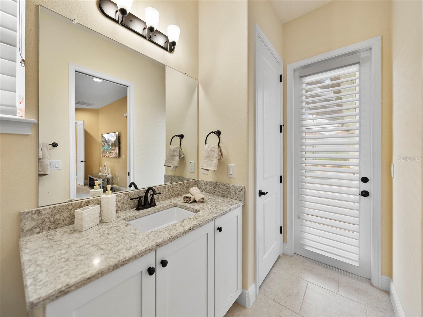 3rd bathroom /w pool access
