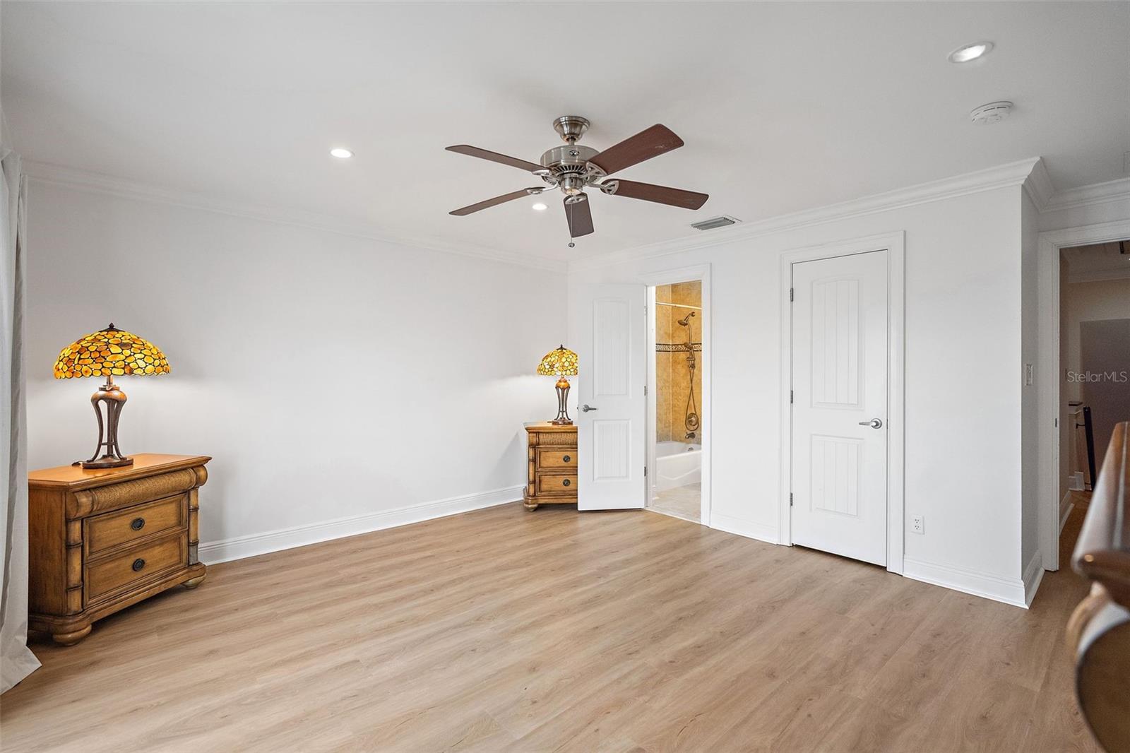 Primary with ensuite bathroom and walk in closet