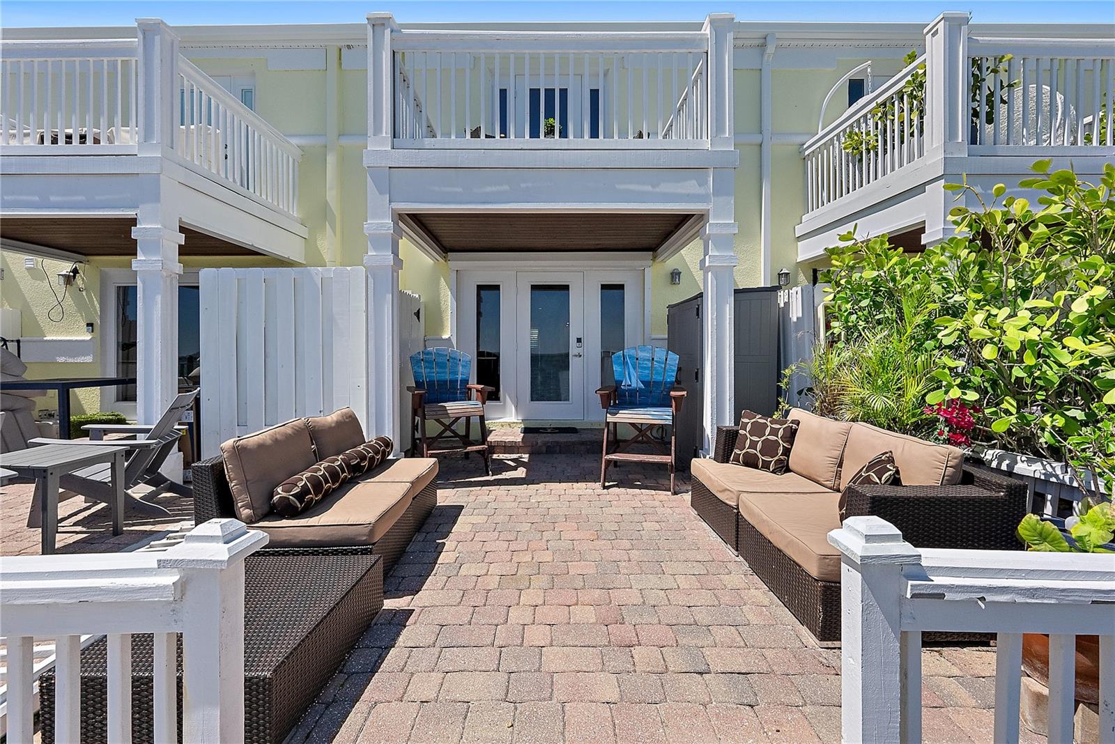 Patio and balcony off of townhome